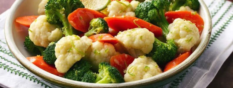 A bowl full of cruciferous vegetables, which have been shown to reduce the risk of many common cancers.