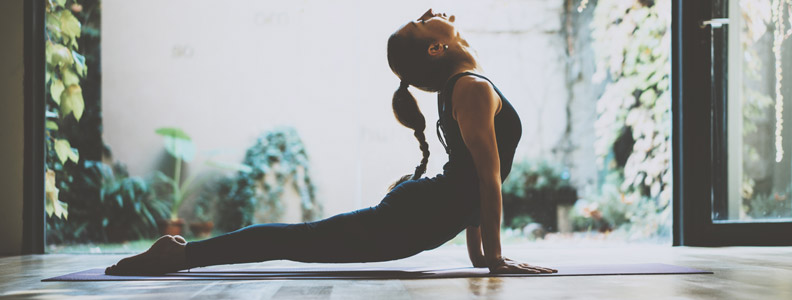 young woman doing a yoga pose