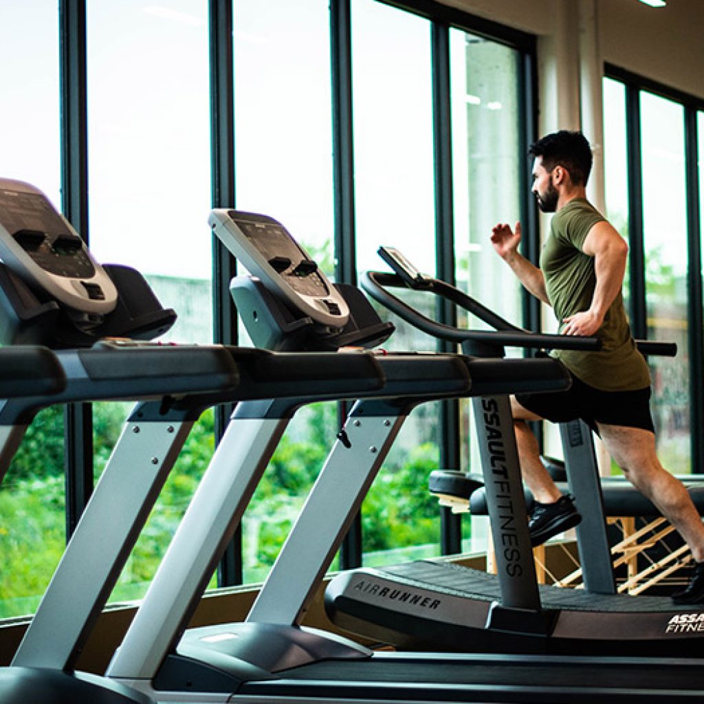 Man running on a treadmill.