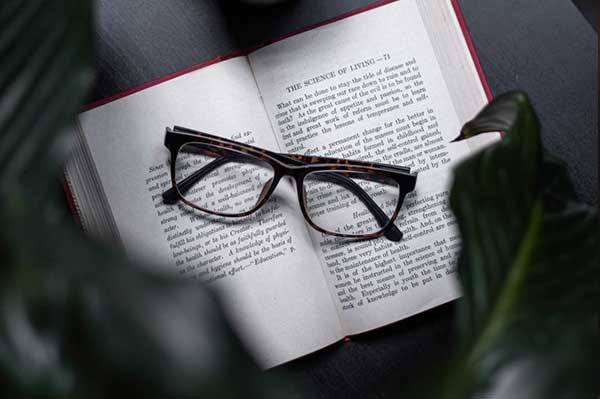 eye-glasses-over-book